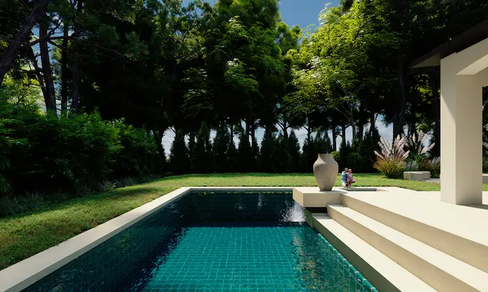 Piscina rectangular con césped y vegetación adaptada al clima frío en villa privada en Polonia