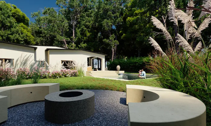 Área de fuego con banco circular en jardín perenne de villa privada en Polonia, rodeada de vegetación ornamental.