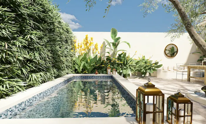 Rectangular courtyard pool with dense ivy plant and decorative lanterns in a Madrid urban garden
