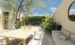 Outdoor dining space with cushioned bench and sun‑resistant planting for arid Mediterranean climates