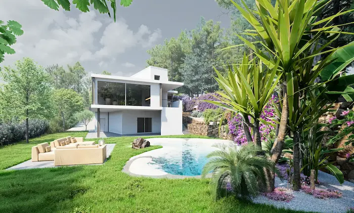 Zona de estar exterior con vegetación mediterránea y fachada moderna en jardín sostenible de Vilanova del Vallès